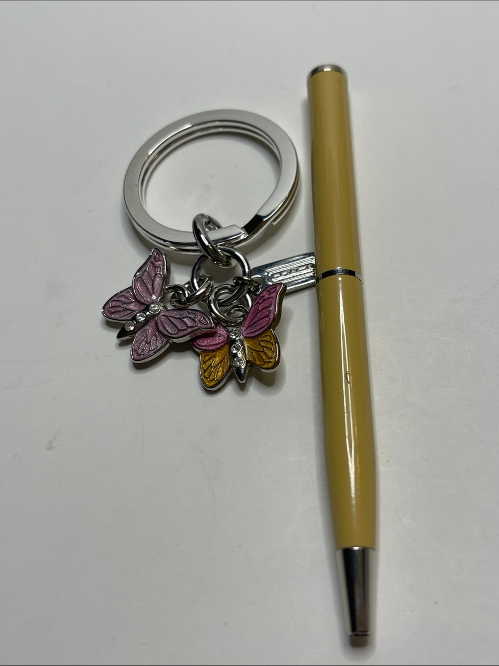 Coach Butterfly Charm Keychain with Pink & Yellow Accents and Coach Pen